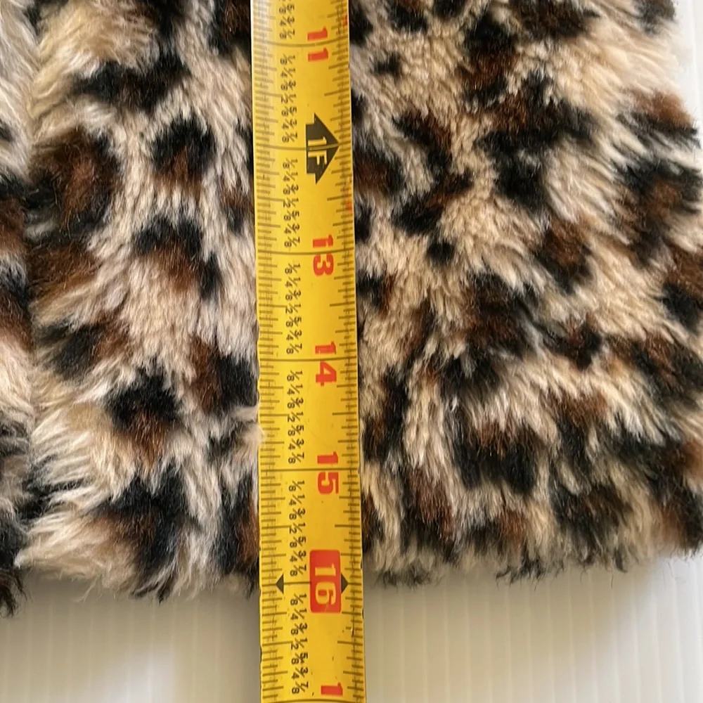 Me Jane black, brown & tan faux fur vest.  Girl’s size 7